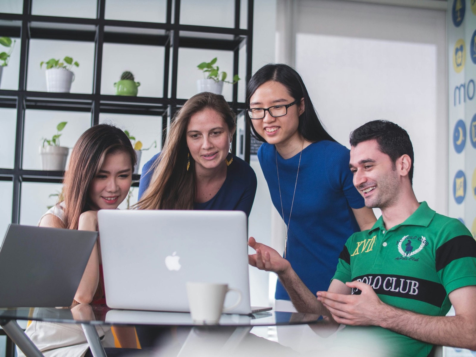 A group of people collaborating around a table.