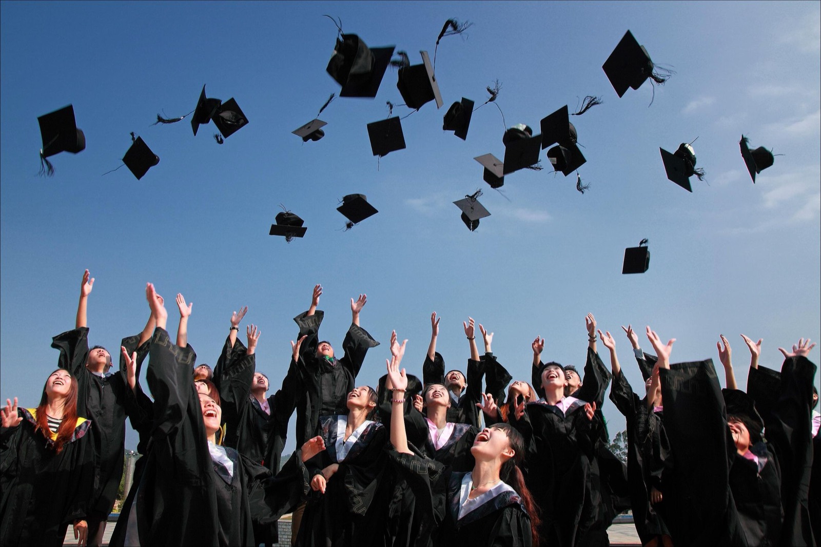 Students at a graduation ceremony.